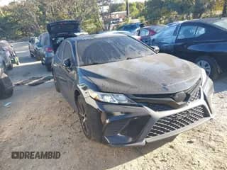 2020 Toyota Camry SE with VIN 4T1G11AK7LU927300, listed as a IAAI auction lot 43327703 with 109,497 mi miles and . Bid and sale history available at DreamBid. Image 1.