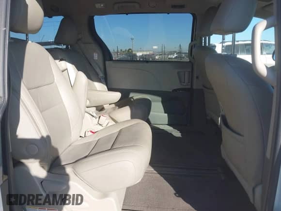 2016 Toyota Sienna XLE with VIN 5TDYK3DC9GS755187, listed as a IAAI auction lot 41344816 with 106,694 mi miles and . Bid and sale history available at DreamBid. Image 8.