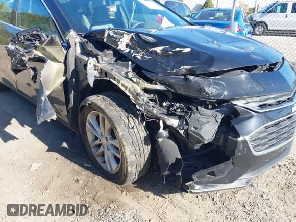 2018 Chevrolet Malibu LT z VIN 1G1ZD5ST7JF145740, wystawiony jako IAAI lot #43370388 z przebiegiem 94 051 mil mil oraz . Historia ofert i sprzedaży dostępna na DreamBid. Obrazek 6.