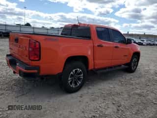 2021 Chevrolet Colorado 4WD Z71 z VIN 1GCGTDEN0M1177214, wystawiony jako Copart lot #69223365 z przebiegiem 34 944 mil mil oraz Czysty tytuł • Clean title. Historia ofert i sprzedaży dostępna na DreamBid. Obrazek 3.