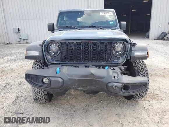 2024 Jeep Wrangler Willys с VIN 1C4RJXN60RW209694, выставлен на аукционе Copart как лот 70931155 с пробегом 19 287 миль миль и Списание • Salvage title. История ставок и продаж доступна на DreamBid. Изображение 5.