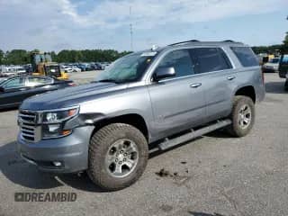 2020 Chevrolet Tahoe LT z VIN 1GNSKBKCXLR295198, wystawiony jako Copart lot #65988315 z przebiegiem 138 357 mil mil oraz Szkoda całkowita • Salvage title. Historia ofert i sprzedaży dostępna na DreamBid. Obrazek 1.