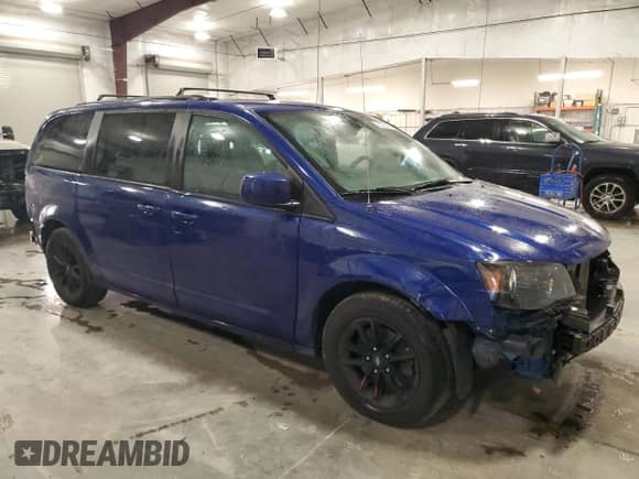 2019 Dodge Grand Caravan GT with VIN 2C4RDGEG3KR716992, listed as a Copart auction lot 82736195 with 51,364 mi miles and Salvage title. Bid and sale history available at DreamBid. Image 4.
