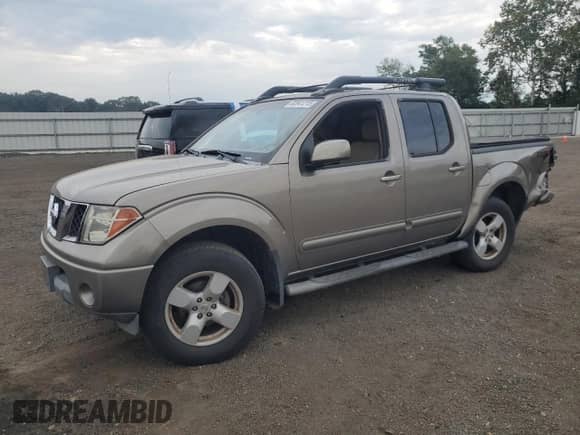 2005 Nissan Frontier LE с VIN 1N6AD07W15C435387, выставлен на аукционе Copart как лот 82041215 с пробегом 191 231 миль миль и Списание • Salvage title. История ставок и продаж доступна на DreamBid. Изображение 1.