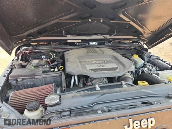 2014 Jeep Wrangler Sport with VIN 1C4AJWAG7EL200220, listed as a Copart auction lot 71811455 with 127,936 mi miles and Salvage title. Bid and sale history available at DreamBid. Image 12.