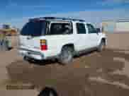 2005 Chevrolet Suburban LT z VIN 3GNEC16Z95G288863, wystawiony jako IAAI lot #41653675 z przebiegiem 309 977 mil mil oraz . Historia ofert i sprzedaży dostępna na DreamBid. Obrazek 4.