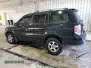 2006 Honda Pilot EX z VIN 5FNYF28456B001501, wystawiony jako Copart lot #65802075 z przebiegiem 290 084 mil mil oraz Szkoda całkowita • Salvage title. Historia ofert i sprzedaży dostępna na DreamBid. Obrazek 2.