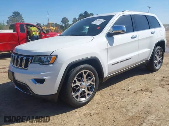 2022 Jeep Grand Cherokee Limited with VIN 1C4RJEBG9NC126472, listed as a IAAI auction lot 42008318 with 77,508 mi miles and . Bid and sale history available at DreamBid. Image 2.