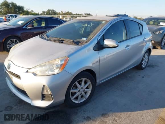 2013 Toyota Prius Three with VIN JTDKDTB32D1557529, listed as a IAAI auction lot 43464925 with 152,825 mi miles and . Bid and sale history available at DreamBid. Image 2.