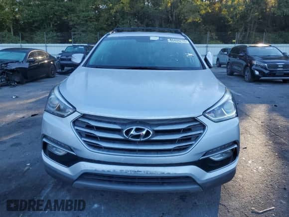 2018 Hyundai Santa Fe 2.4L с VIN 5XYZU3LB6JG555881, выставлен на аукционе Copart как лот 86409215 с пробегом 180 601 миль миль и Чистый • Clean title. История ставок и продаж доступна на DreamBid. Изображение 5.
