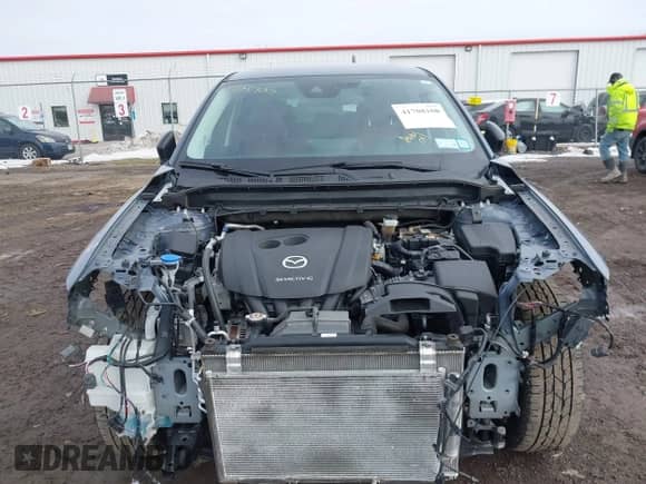 2022 Mazda CX-5 S Carbon Edition z VIN JM3KFBCM2N0529241, wystawiony jako IAAI lot #41708100 z przebiegiem 24 139 mil mil oraz . Historia ofert i sprzedaży dostępna na DreamBid. Obrazek 13.