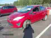 2011 Ford Fiesta SE with VIN 3FADP4EJXBM148068, listed as a IAAI auction lot 43387030 with 154,821 mi miles and . Bid and sale history available at DreamBid. Image 2.