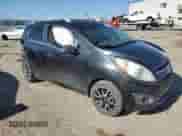 2013 Chevrolet Spark LT with VIN KL8CF6S96DC513373, listed as a Copart auction lot 57693495 with 192,702 mi miles and Salvage title. Bid and sale history available at DreamBid. Image 4.
