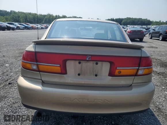 2000 Saturn LS with VIN 1G8JU52F6YY606949, listed as a Copart auction lot 71205344 with 225,150 mi miles and Salvage title. Bid and sale history available at DreamBid. Image 6.