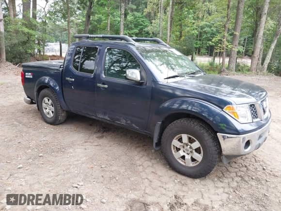 2006 Nissan Frontier SE with VIN 1N6AD07W96C411100, listed as a IAAI auction lot 43206893 with 159,756 mi miles and . Bid and sale history available at DreamBid. Image 1.