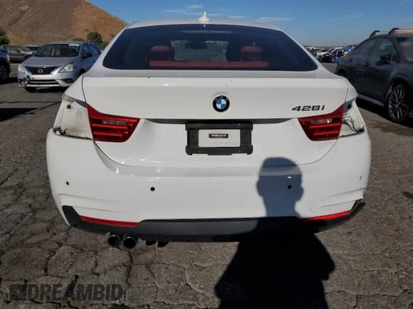 2015 BMW 4 Series 428i z VIN WBA4A9C58FGL86058, wystawiony jako Copart lot #65942035 z przebiegiem 121 605 mil mil oraz Szkoda całkowita • Salvage title. Historia ofert i sprzedaży dostępna na DreamBid. Obrazek 6.