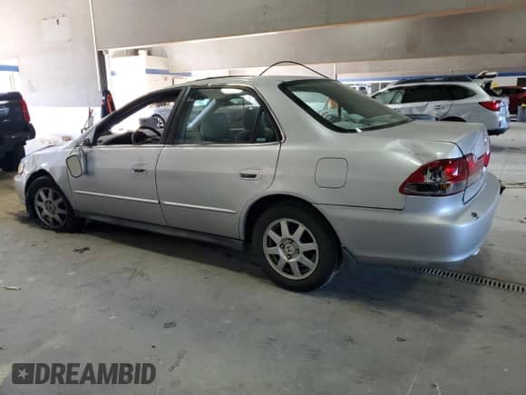 2002 Honda Accord SE with VIN 1HGCG66802A143764, listed as a Copart auction lot 82512395 with 174,800 mi miles and Salvage title. Bid and sale history available at DreamBid. Image 2.