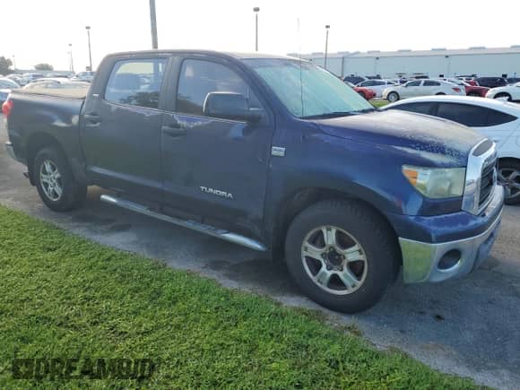 2007 Toyota Tundra SR5 z VIN 5TBET54117S455677, wystawiony jako Copart lot #74101544 z przebiegiem Nie podano mil oraz Szkoda całkowita • Salvage title. Historia ofert i sprzedaży dostępna na DreamBid. Obrazek 4.