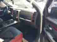 2015 Ram 1500 Rebel with VIN 1C6RR7YT4FS785518, listed as a IAAI auction lot 42553985 with 137,743 mi miles and . Bid and sale history available at DreamBid. Image 5.