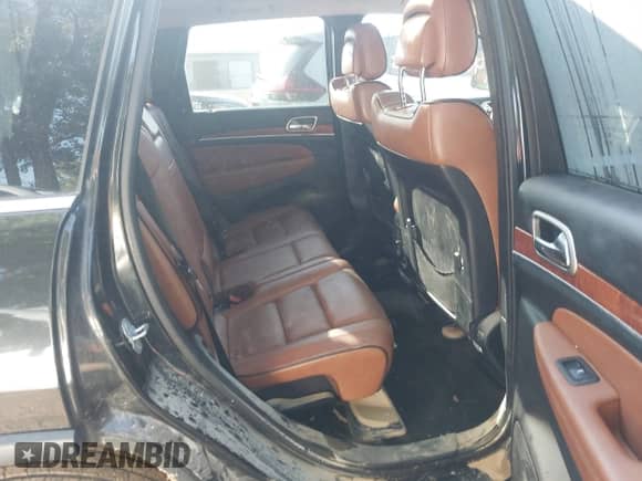 2012 Jeep Grand Cherokee Overland Summit z VIN 1C4RJFCT0CC290059, wystawiony jako IAAI lot #42934308 z przebiegiem 181 297 mil mil oraz . Historia ofert i sprzedaży dostępna na DreamBid. Obrazek 8.