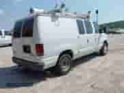 2012 Ford Econoline Cargo Commercial with VIN 1FTNE1EW0CDB13390, listed as a IAAI auction lot 42899058 with 119,855 mi miles and . Bid and sale history available at DreamBid. Image 4.