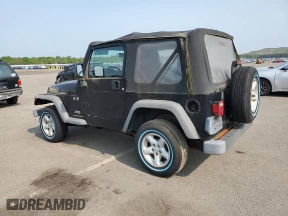 2003 Jeep Wrangler X z VIN 1J4FA39S23P359983, wystawiony jako Copart lot #59469005 z przebiegiem 118 585 mil mil oraz Czysty tytuł • Clean title. Historia ofert i sprzedaży dostępna na DreamBid. Obrazek 2.