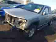 2012 Chevrolet Colorado 1LT z VIN 1GCJTCFEXC8103982, wystawiony jako IAAI lot #41850692 z przebiegiem 149 114 mil mil oraz . Historia ofert i sprzedaży dostępna na DreamBid. Obrazek 18.