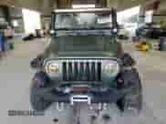 2000 Jeep Wrangler Sport with VIN 1J4FA49S2YP710100, listed as a Copart auction lot 85668155 with Not provided miles and Clean title. Bid and sale history available at DreamBid. Image 5.