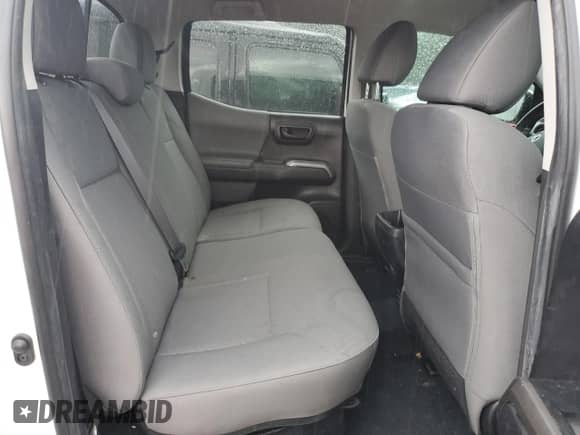 2023 Toyota Tacoma SR5 z VIN 3TMAZ5CN1PM206336, wystawiony jako Copart lot #82145395 z przebiegiem 26 296 mil mil oraz Szkoda całkowita • Salvage title. Historia ofert i sprzedaży dostępna na DreamBid. Obrazek 10.
