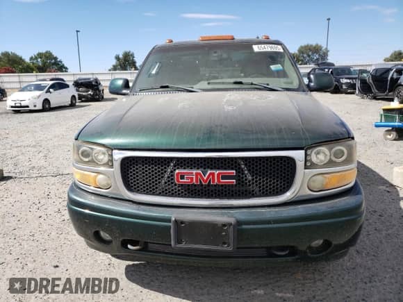2002 GMC Sierra 1500 Denali z VIN 2GTFK69U021329107, wystawiony jako Copart lot #65479695 z przebiegiem 224 881 mil mil oraz Czysty tytuł • Clean title. Historia ofert i sprzedaży dostępna na DreamBid. Obrazek 5.