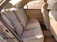 2004 Toyota Corolla CE z VIN 1NXBR32EX4Z211399, wystawiony jako Copart lot #87423445 z przebiegiem 175 091 mil mil oraz Czysty tytuł • Clean title. Historia ofert i sprzedaży dostępna na DreamBid. Obrazek 10.