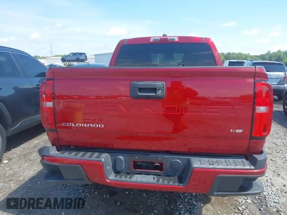 2021 Chevrolet Colorado 4WD LT with VIN 1GCGTCEN9M1132430, listed as a IAAI auction lot 42267714 with 104,252 mi miles and . Bid and sale history available at DreamBid. Image 16.