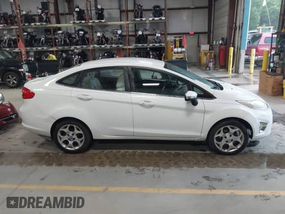 2012 Ford Fiesta SEL with VIN 3FADP4CJXCM161505, listed as a IAAI auction lot 42716954 with 153,982 mi miles and . Bid and sale history available at DreamBid. Image 13.