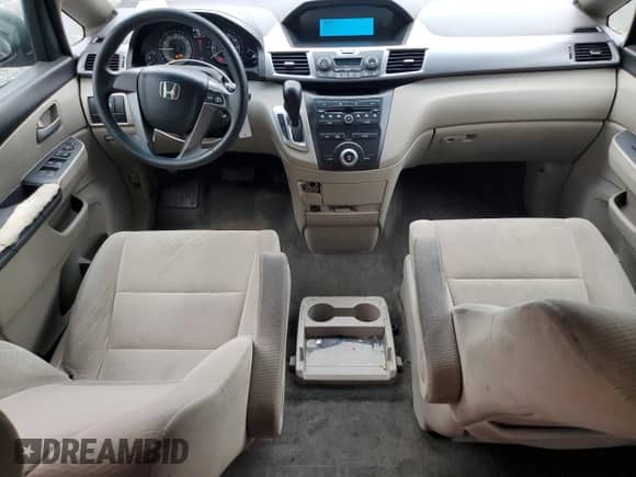 2012 Honda Odyssey LX z VIN 5FNRL5H28CB094801, wystawiony jako Copart lot #81809875 z przebiegiem 161 866 mil mil oraz Szkoda całkowita • Salvage title. Historia ofert i sprzedaży dostępna na DreamBid. Obrazek 8.