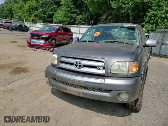 2004 Toyota Tundra SR5 z VIN 5TBRT34134S443967, wystawiony jako Copart lot #68913605 z przebiegiem Nie podano mil oraz Szkoda całkowita • Salvage title. Historia ofert i sprzedaży dostępna na DreamBid. Obrazek 13.