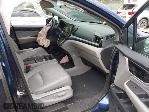 2018 Honda Odyssey Elite with VIN 5FNRL6H92JB030933, listed as a IAAI auction lot 43397917 with 74,671 mi miles and . Bid and sale history available at DreamBid. Image 5.