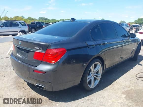 2012 BMW 7 Series 750i with VIN WBAKA8C58CDX01276, listed as a IAAI auction lot 43156573 with 115,967 mi miles and . Bid and sale history available at DreamBid. Image 4.