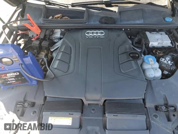 2017 Audi Q7 Premium Plus z VIN WA1LAAF76HD012513, wystawiony jako Copart lot #82142905 z przebiegiem 104 981 mil mil oraz Szkoda całkowita • Salvage title. Historia ofert i sprzedaży dostępna na DreamBid. Obrazek 11.