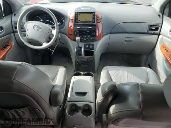 2010 Toyota Sienna XLE с VIN 5TDYK4CC1AS342159, выставлен на аукционе Copart как лот 84412115 с пробегом 214 042 миль миль и Списание • Salvage title. История ставок и продаж доступна на DreamBid. Изображение 8.