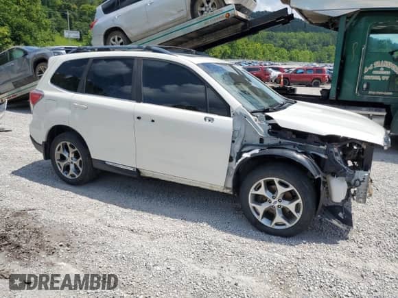 2017 Subaru Forester Touring с VIN JF2SJATC3HH433151, выставлен на аукционе Copart как лот 66028405 с пробегом 147 898 миль миль и Списание • Salvage title. История ставок и продаж доступна на DreamBid. Изображение 4.