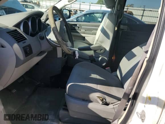 2010 Dodge Grand Caravan SE with VIN 2D4RN4DE0AR120557, listed as a Copart auction lot 70667235 with 184,516 mi miles and Salvage title. Bid and sale history available at DreamBid. Image 7.