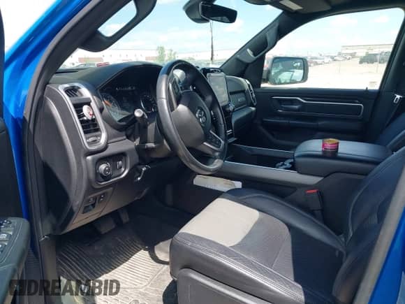 2020 Ram 1500 Lone Star with VIN 1C6SRFFT0LN361097, listed as a IAAI auction lot 42605099 with 91,766 mi miles and . Bid and sale history available at DreamBid. Image 5.