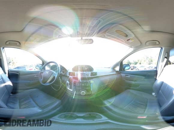 2013 Honda Odyssey EX-L with VIN 5FNRL5H65DB025620, listed as a IAAI auction lot 43409304 with 211,932 mi miles and . Bid and sale history available at DreamBid. Image 19.