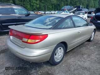 1999 Saturn SC with VIN 1G8ZY1277XZ229503, listed as a IAAI auction lot 42435302 with 217,039 mi miles and . Bid and sale history available at DreamBid. Image 4.