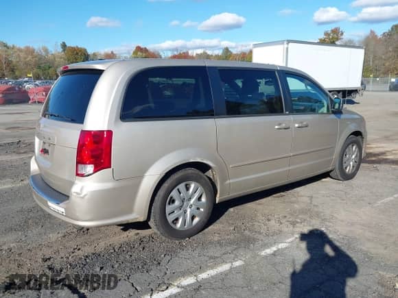 2014 Dodge Grand Caravan SE z VIN 2C4RDGBG2ER106719, wystawiony jako IAAI lot #43560873 z przebiegiem 183 833 mil mil oraz . Historia ofert i sprzedaży dostępna na DreamBid. Obrazek 4.