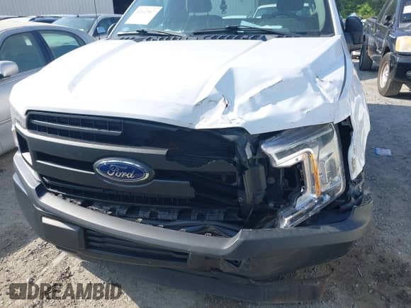 2019 Ford F-150 XL with VIN 1FTMF1CB7KKC45775, listed as a IAAI auction lot 42167917 with 94,220 mi miles and . Bid and sale history available at DreamBid. Image 6.