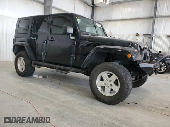 2007 Jeep Wrangler Unlimited Sahara z VIN 1J4GA59117L151310, wystawiony jako Copart lot #84026945 z przebiegiem 132 882 mil mil oraz Czysty tytuł • Clean title. Historia ofert i sprzedaży dostępna na DreamBid. Obrazek 4.