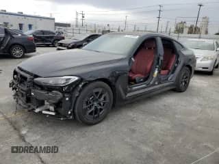 2023 BMW i4 eDrive35 with VIN WBY43AW07PFR39691, listed as a Copart auction lot 70183455 with 14,470 mi miles and Salvage title. Bid and sale history available at DreamBid. Image 1.