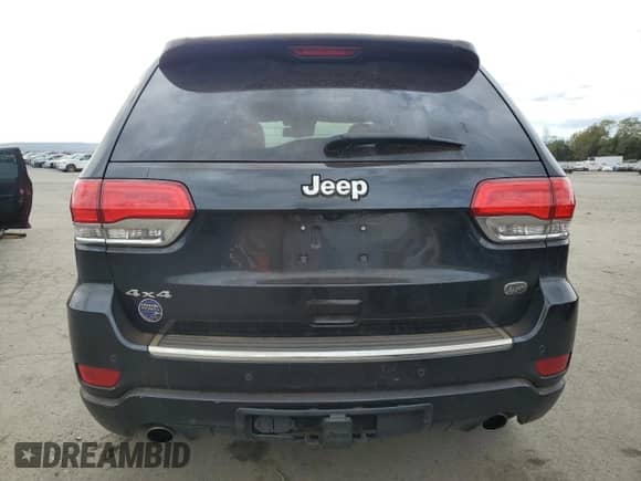 2016 Jeep Grand Cherokee Overland with VIN 1C4RJFCG6GC489769, listed as a Copart auction lot 82302855 with 136,225 mi miles and Salvage title. Bid and sale history available at DreamBid. Image 6.