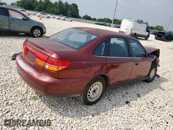 2001 Saturn LS with VIN 1G8JU52F51Y548693, listed as a Copart auction lot 57218355 with Not provided miles and Salvage title. Bid and sale history available at DreamBid. Image 3.